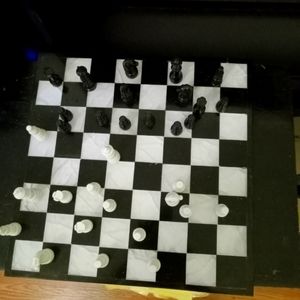 Chess board marble with pieces black n white